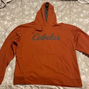 Men’s Size XL Cabela’s Brand Hoodie. Dark Orange W/ Charcoal Grey Letters.